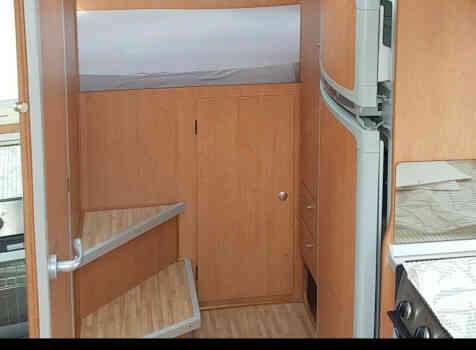 camping-car BENIMAR   PERSEO 540  intérieur / couchage principal